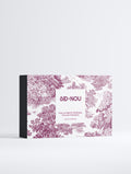 Product packaging with floral design and 'SID & NOU' branding on a white background